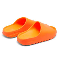 Step into Style: Unveiling the Citrus Elegance with Orange Yeezy Slides!