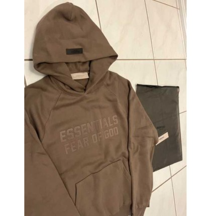 The Timeless Appeal of the Brown Essentials Hoodie