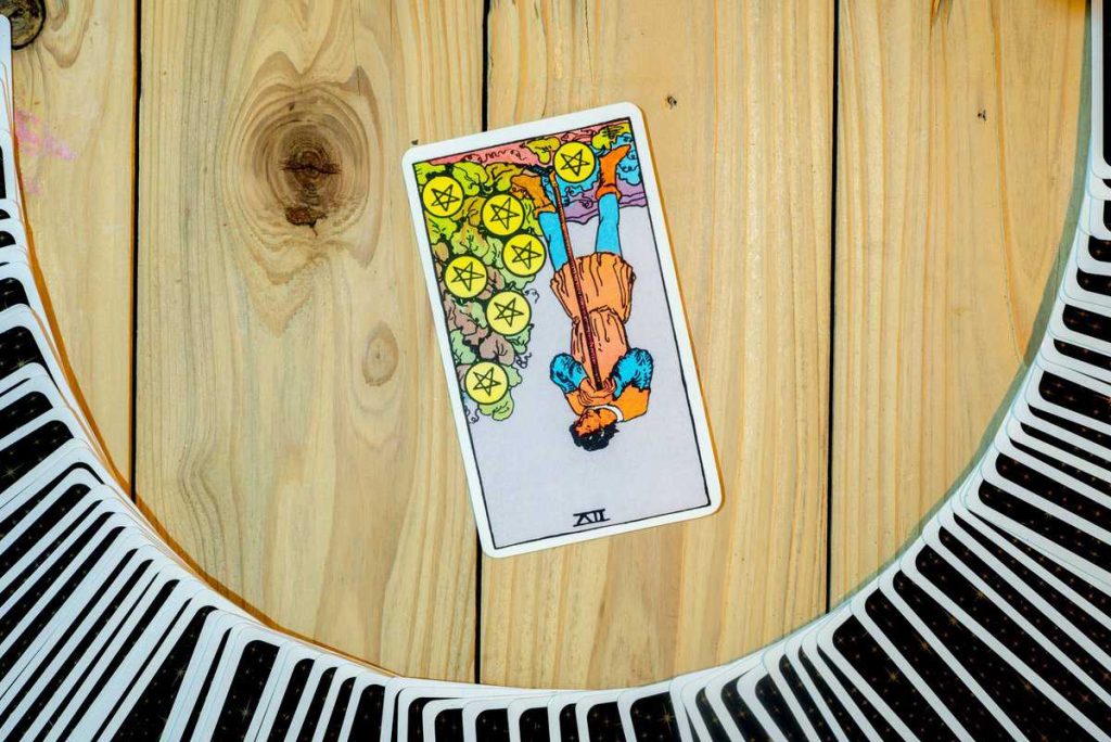 What Does the Seven of Pentacles as Feelings Mean in Love and Relationships?