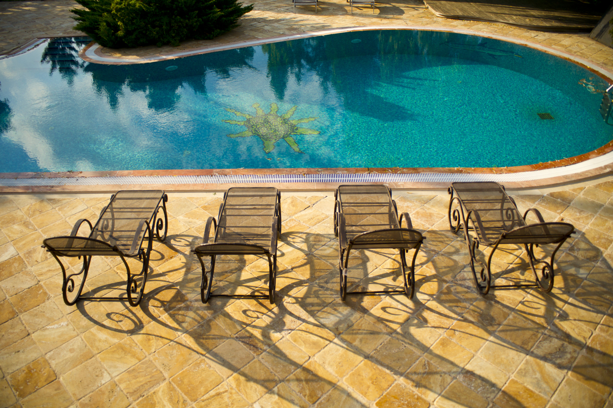 Why Pool Deck Resurfacing is Essential for Your Backyard Oasis